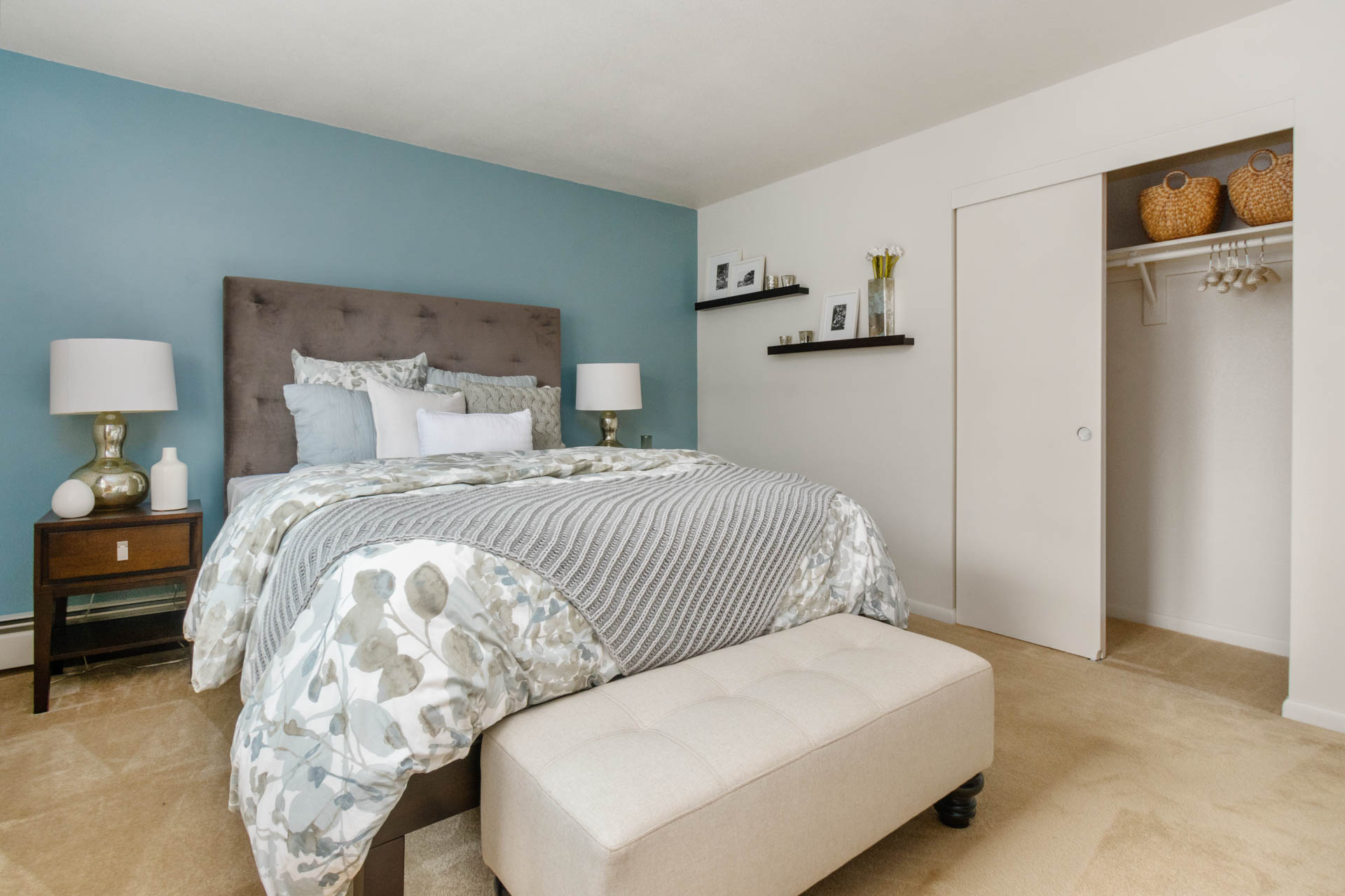 Spacious bedroom inside Saunders Crossing Apartments in Lawrence, MA