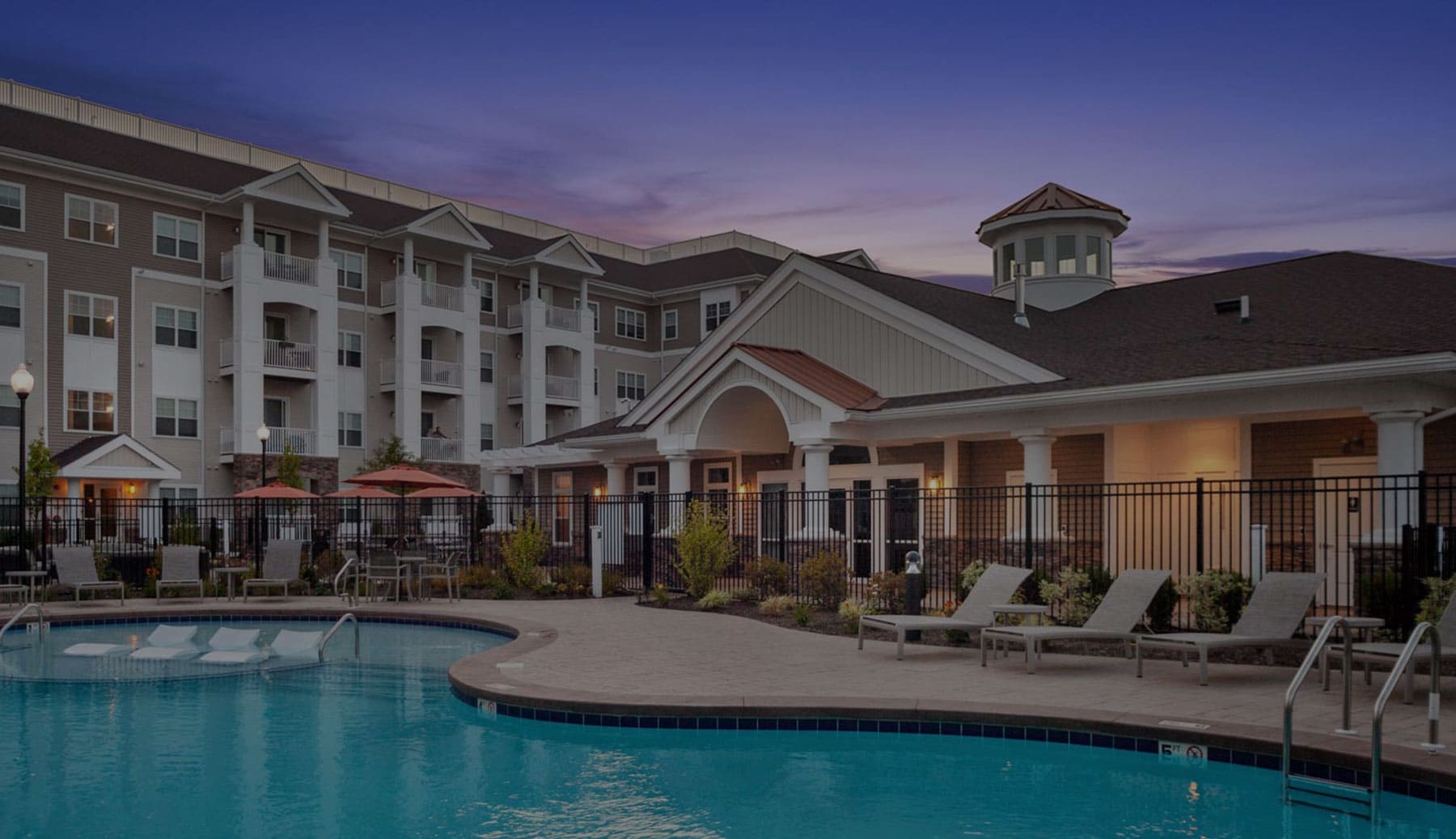 Outdoor pool at the Corsa Apartments in Salem, North Hampshire